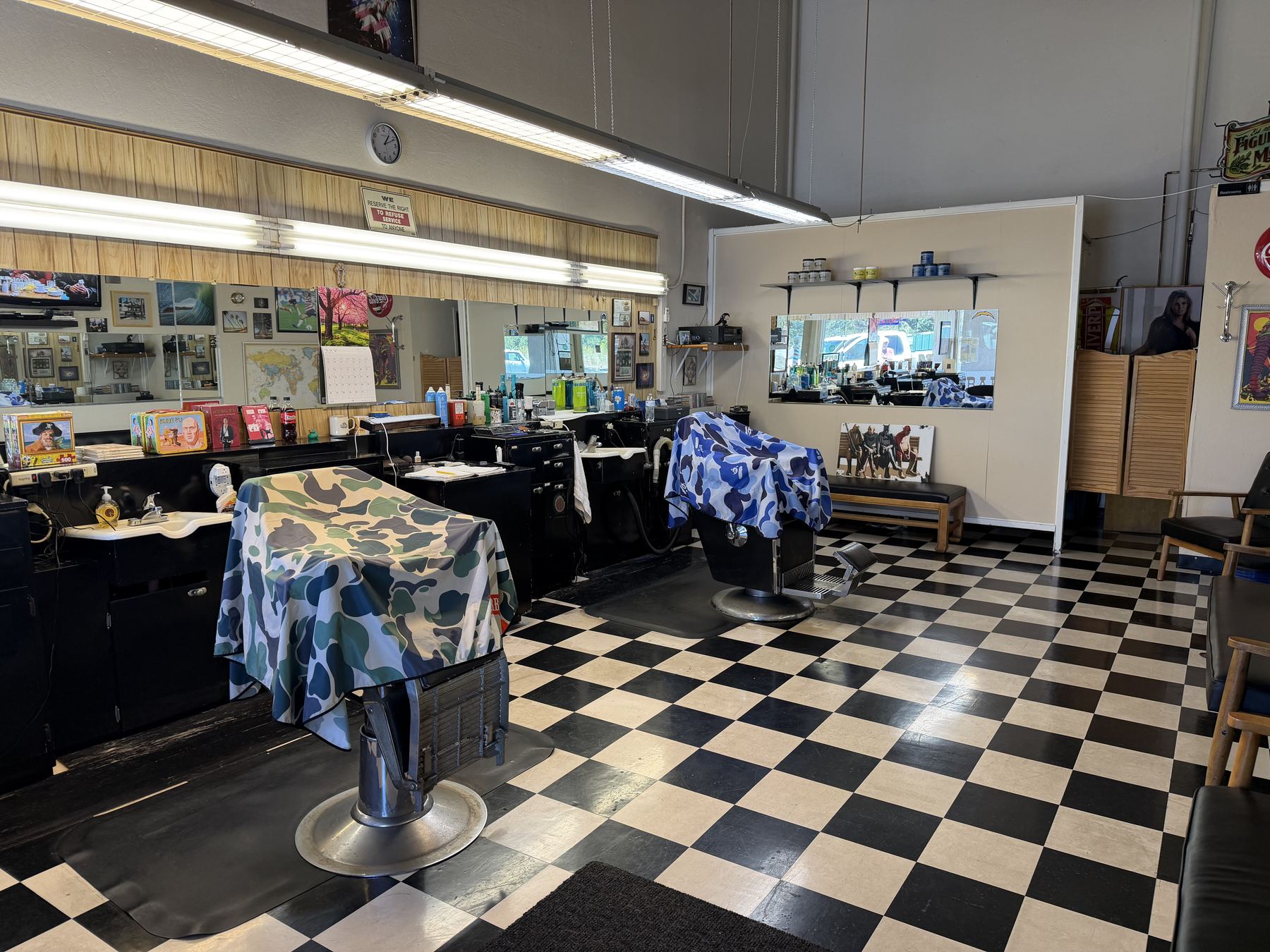 Barber chairs and station inside Village Barber Shop